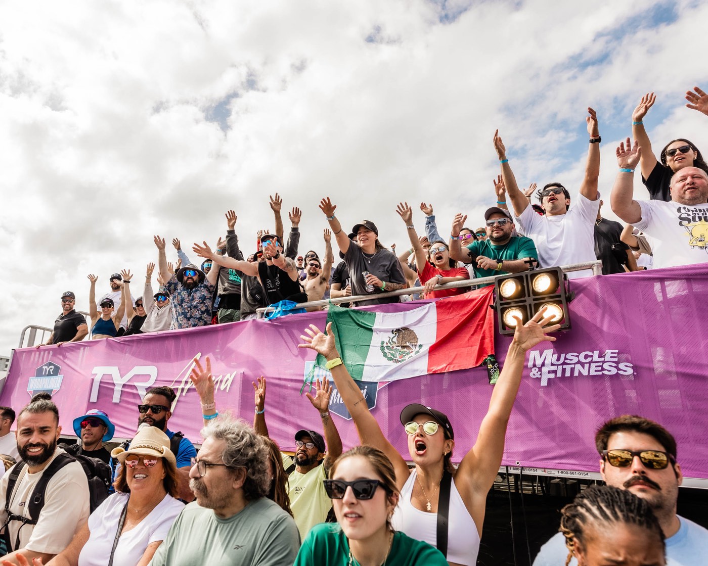 Fans on their feet cheering at Wodapalooza